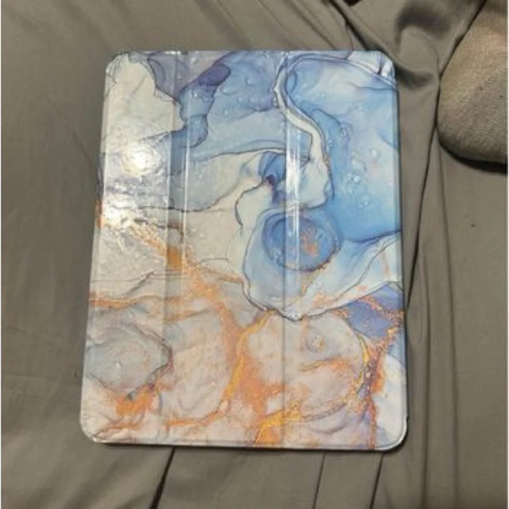 Apple iPad Air 2020 with Apple Pencil 2nd generation and case.